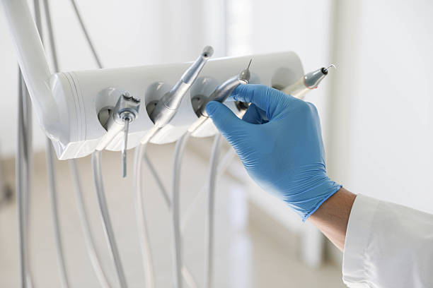 Professional Emergency Dentist technician working in Brielle, NJ